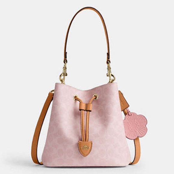 Coach Handbags - NWT Rowan Bucket Bag In Signature Canvas With Charms 🌸